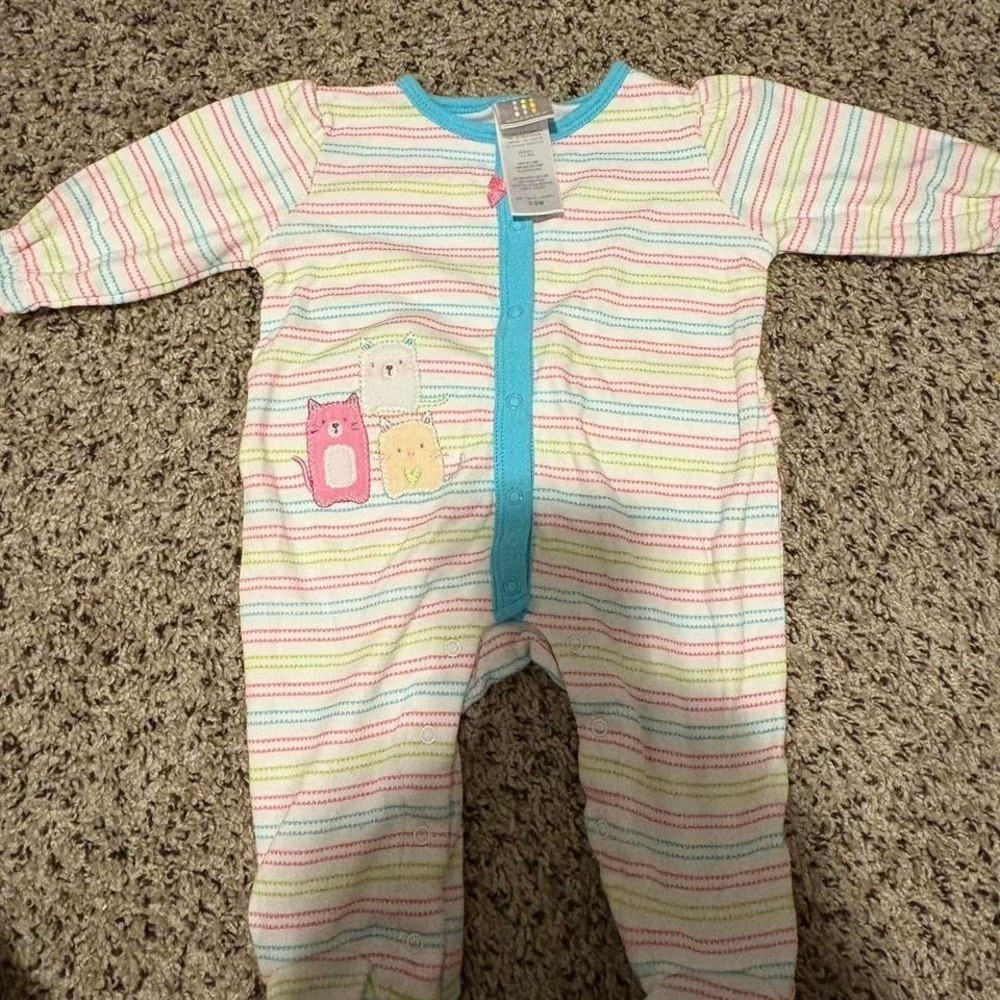 Multi-coloured absorba baby sleepsuit